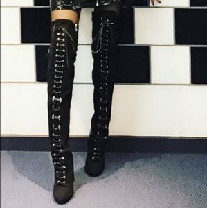 Thigh high lace up boots